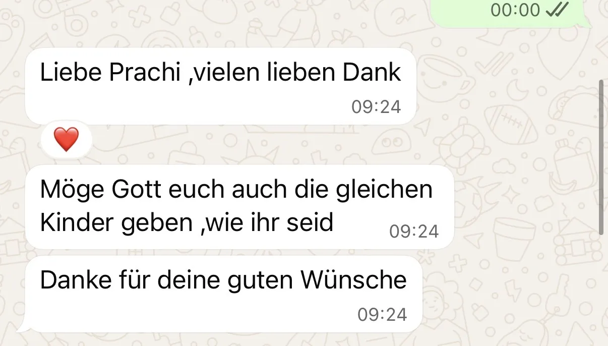 A WhatsApp message from my landlord in German, wishing us well.
